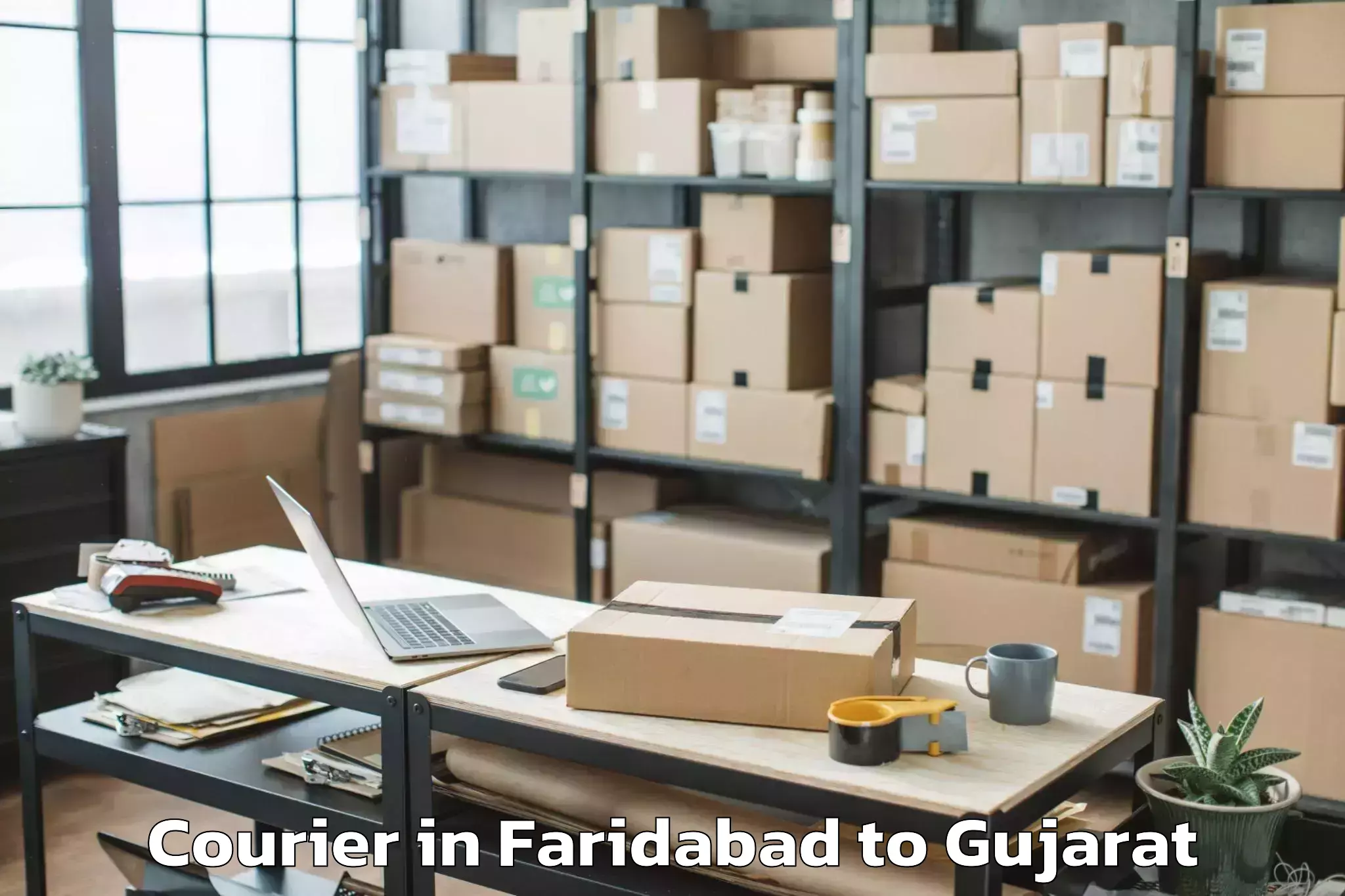 Book Faridabad to Dhuwaran Courier